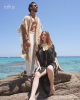 <p>Make a bold statement with effortless style in this duo look from the <em>Aurales Bohemian Collection</em>. The combination of neutral tones and fringe details creates a captivating contrast against the serene backdrop of the turquoise sea. His laid-back fringed cape pairs perfectly with lightweight, flowing trousers, embodying a rugged yet relaxed beachside elegance. She exudes sophistication in a black fringed cover-up adorned with a statement shell necklace, blending bohemian charm with modern flair. Together, they are the epitome of coastal luxury, perfect for an escape to the seaside, where style meets serenity.</p>