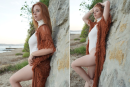 <h3 class="" data-start="51" data-end="68">✧ Style Tip</h3>
<p class="" data-start="69" data-end="120">Balance bold texture with clean lines underneath.</p>
<p class="" data-start="122" data-end="287">The rust-colored fringed kimono adds rich movement and bohemian flair — pair it with a simple, fitted one-piece in white or cream to let the statement piece shine.</p>
<p class="" data-start="289" data-end="396">Complete the look with natural accents like wooden bangles or a straw hat for that effortless coastal vibe.</p>
<p class="" data-start="398" data-end="450">🧡 A beach-ready style that feels elevated and easy.</p>